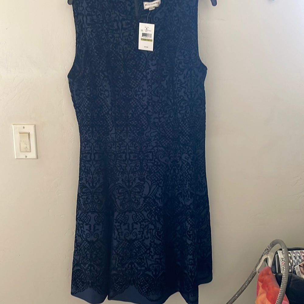 Fit and flare style dress, brand new with tags. Fits as expected